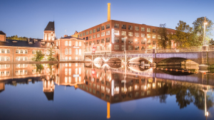 Visit Tampere / Finlayson_Frenckell_and_Tammerkoski_by_night_Reflections